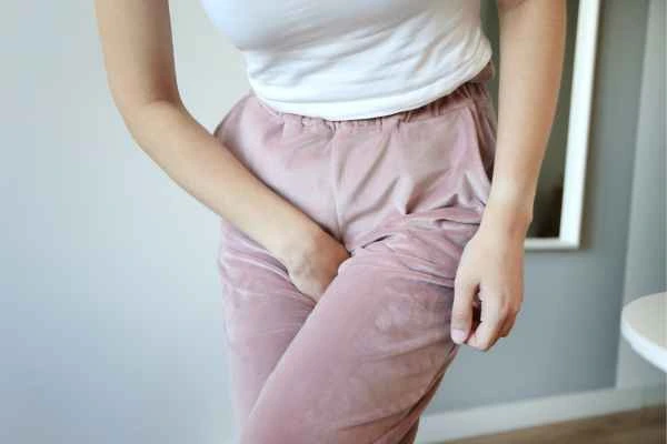 woman struggling with urine incontinence Collier's Wood